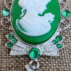 Victorian Style Green Cameo Brooch With Dangle Accent